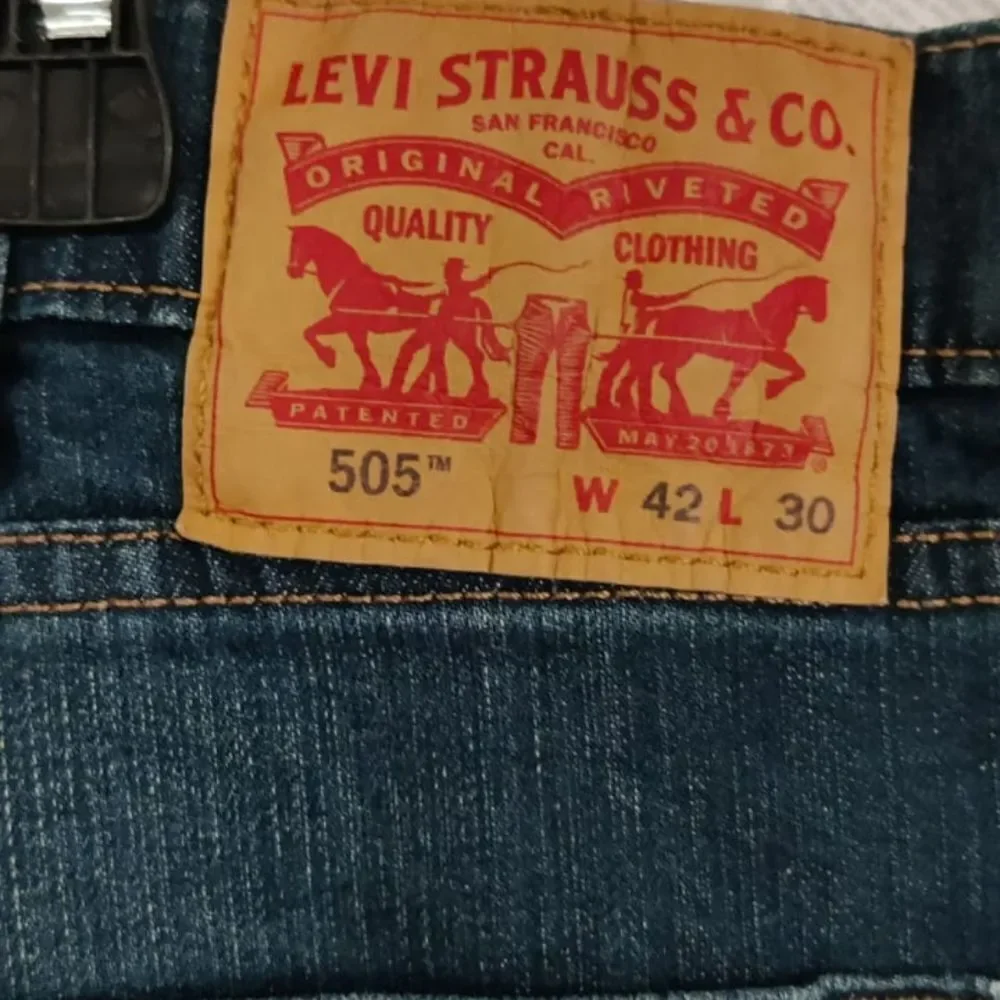 Levi's Men's Relaxed Fit Jeans in Deep Blue Size 42/30